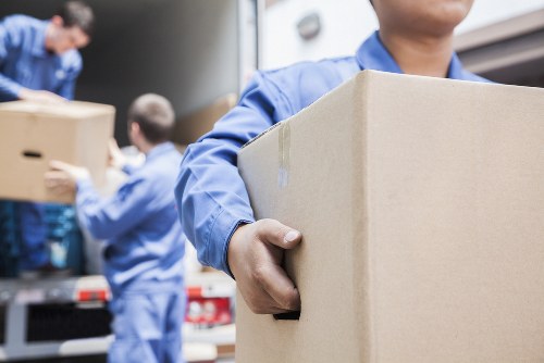 Person organising boxes in Thamesmead storage unit