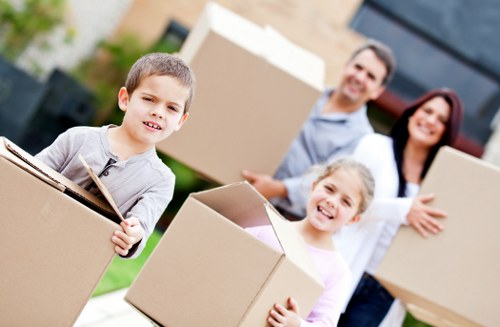 Local removals team handling furniture in Thamesmead