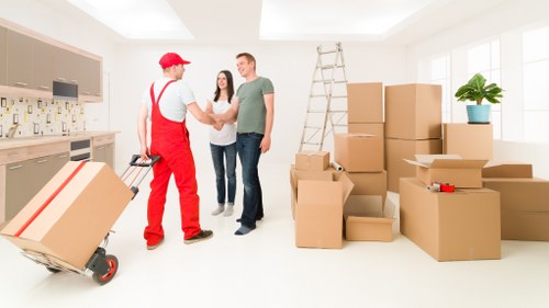 Professional office relocation team handling equipment during Thamesmead office removals